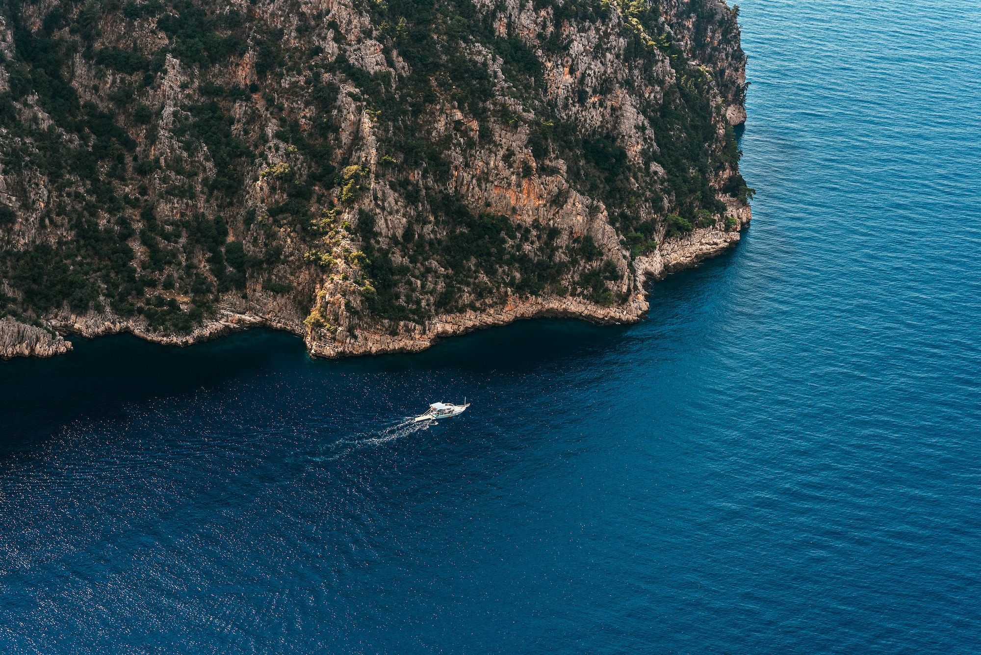 Summer landscape with sea and mountain range. Sea aerial view. Blue mountains and blue sea